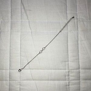 Silver infinity bracelet.